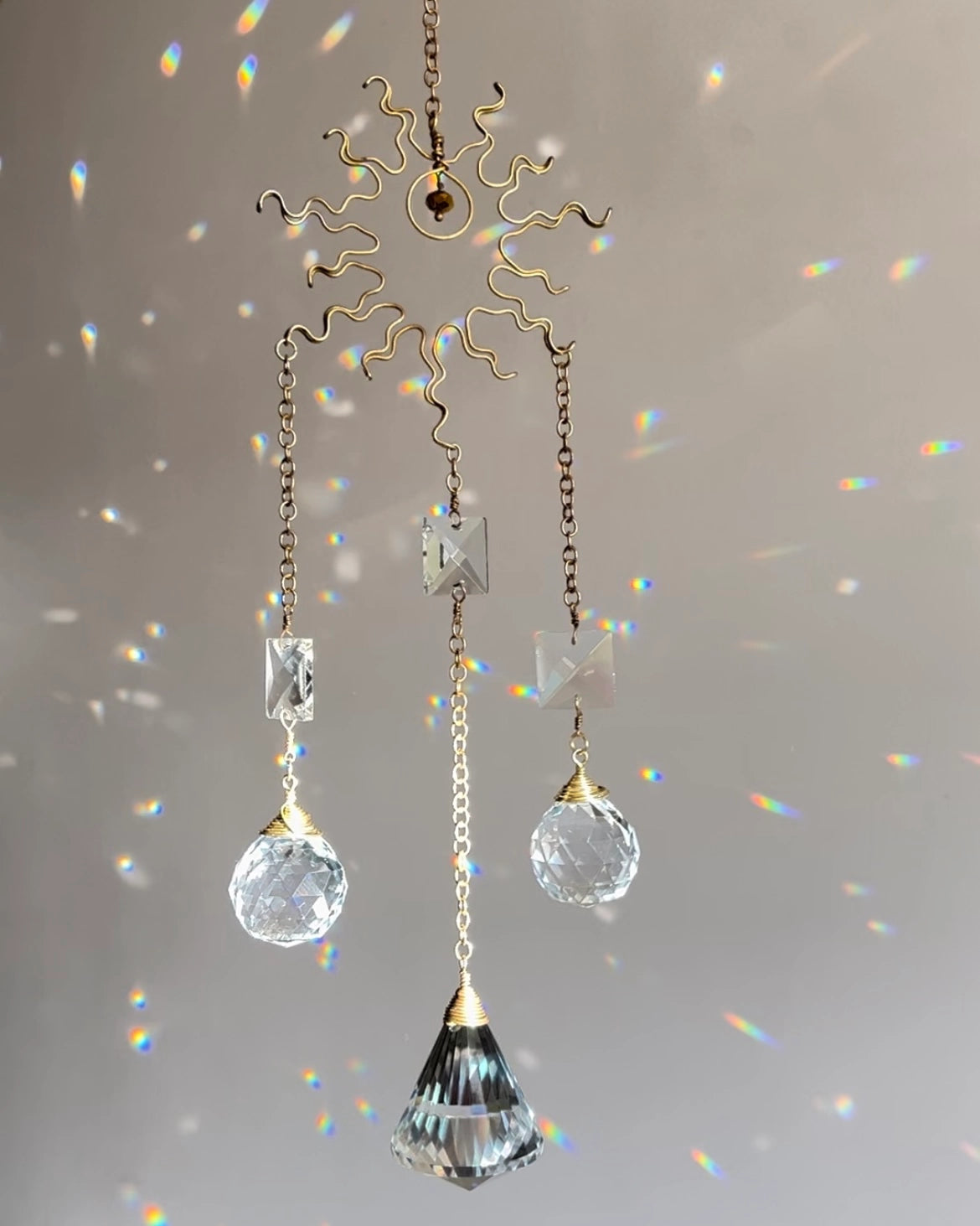 Wired sun suncatcher with clear crystals handmade by A Creator's Studio 