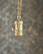 Brass box (dibbi) pendant with a labradorite in the centre with a chain handmade by A Creator's Studio