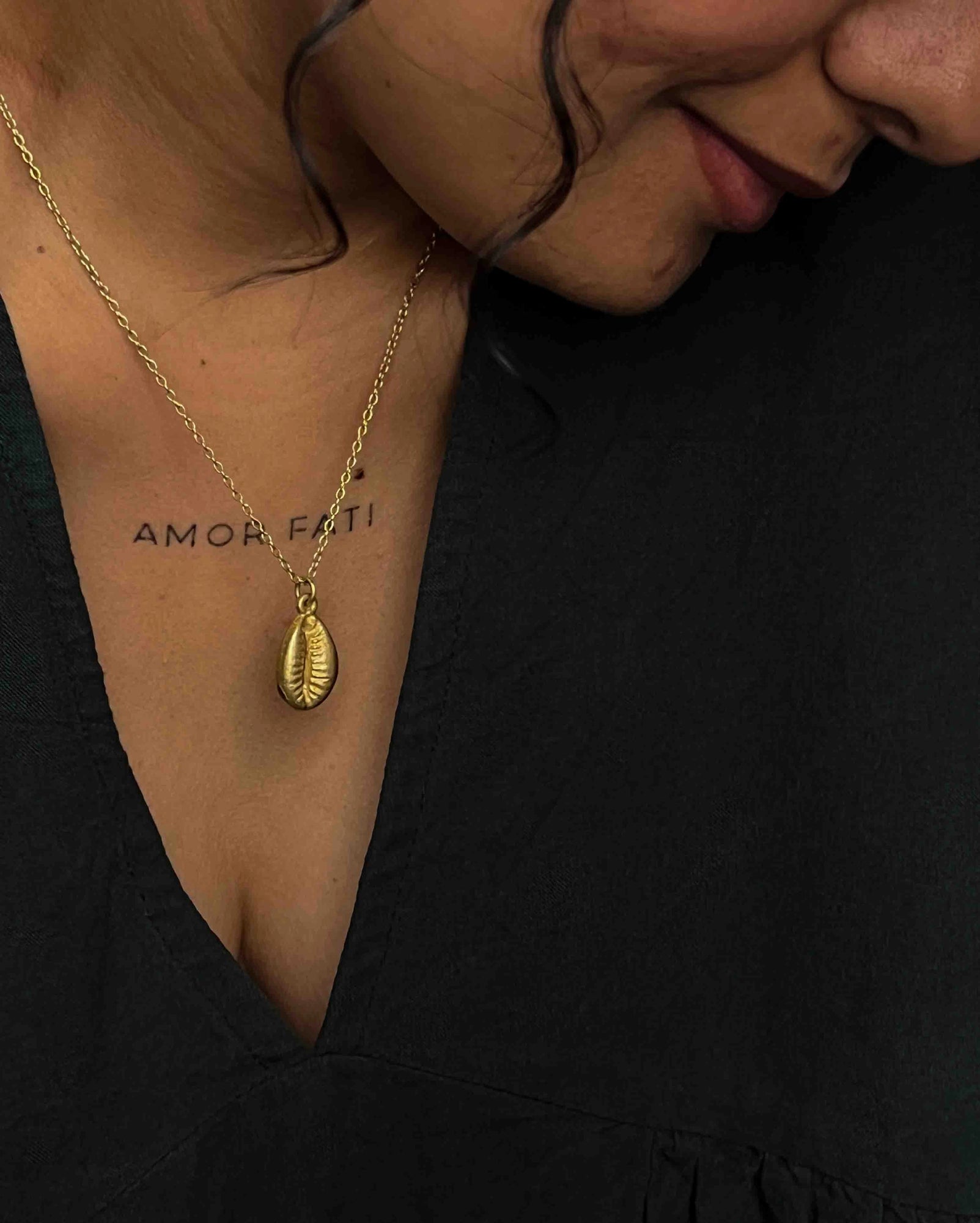 Brass necklace with a coffee bean pendant handmade by A Creator's Studio