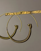 Brass snake hoop earrings handmade by A Creator's Studio