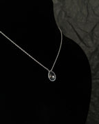 Dainty Silver Chain with a clear quartz drop pendant handmade by A Creator's Studio