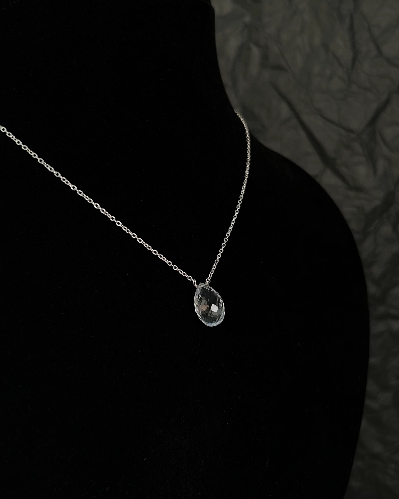 Dainty Silver Chain with a clear quartz drop pendant handmade by A Creator's Studio