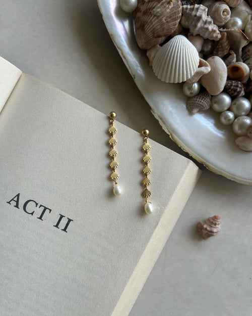 Gold Plated seashell dangle earrings with a fresh water pearl drop handmade by A Creator's Studio