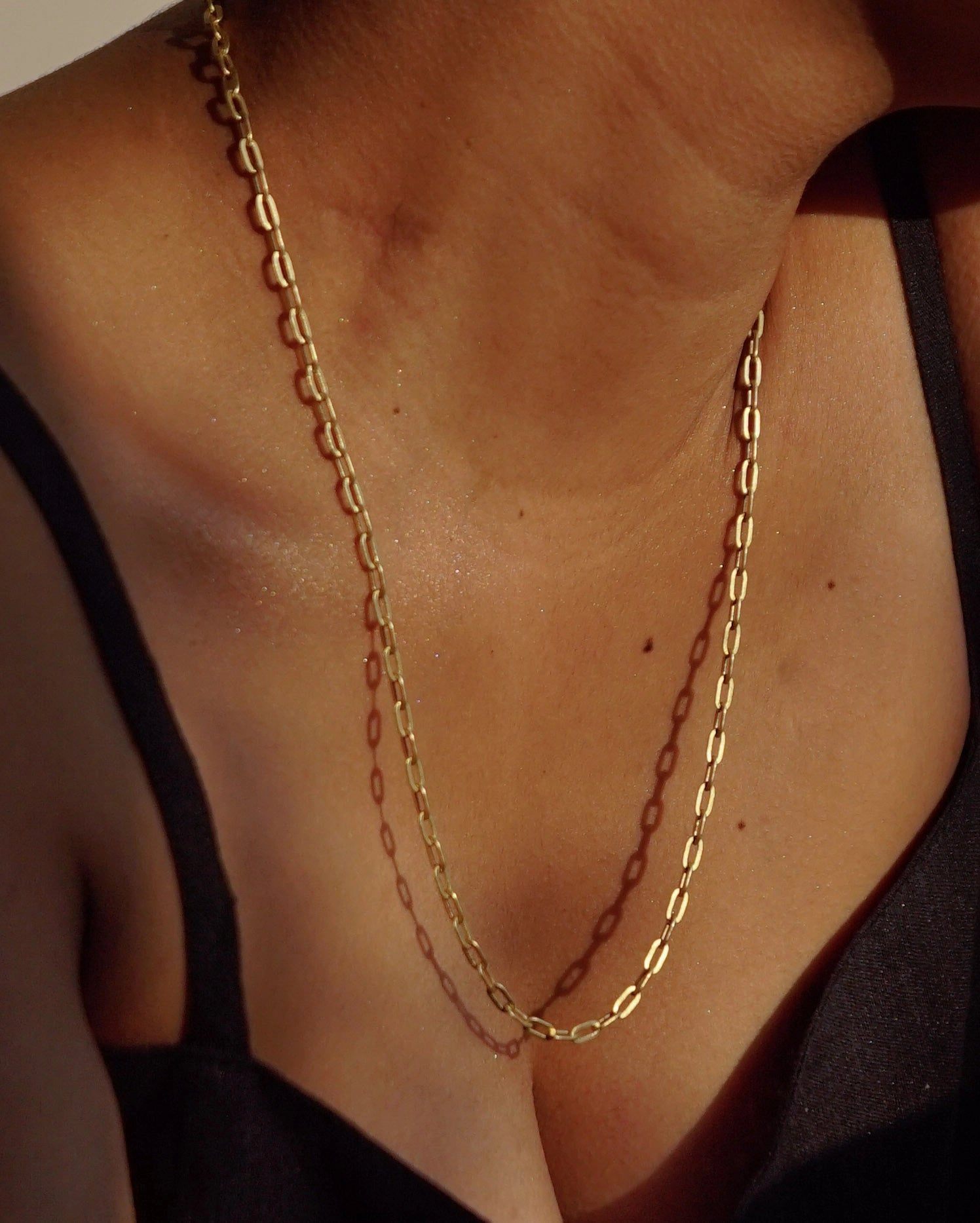 Brass rectangular link chain with flat links handmade by A Creator's Studio