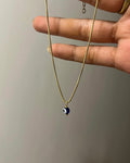 Brass evil eye anklet with an evil eye bead drop handmade by A Creator's Studio