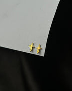 Brass sword-shaped stud earrings handmade by A Creator's Studio