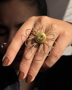 Brass ring with a unique flower design handmade by A Creator's Studio