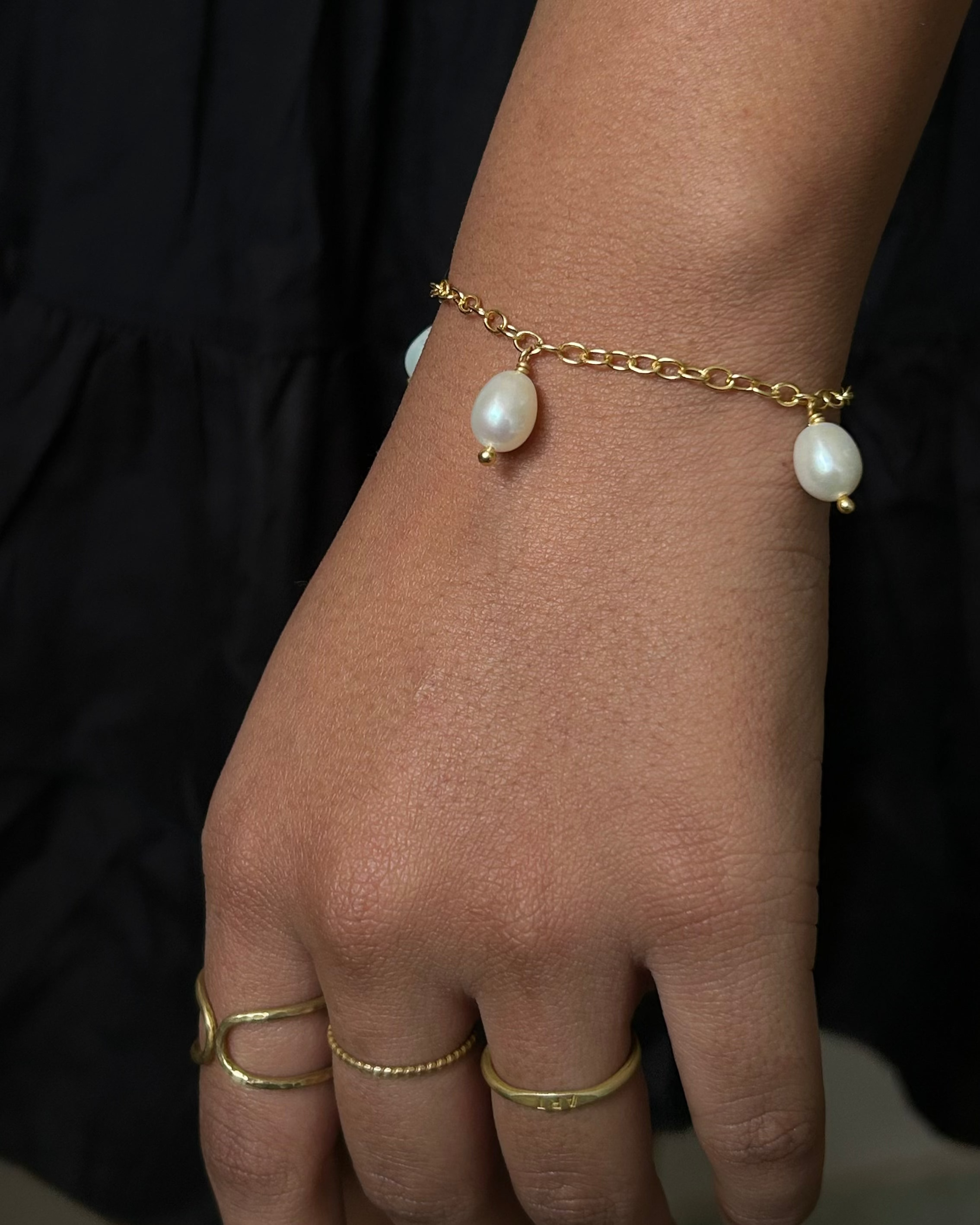 Multi Charm Freshwater pearl bracelet handmade by A Creator's Studio