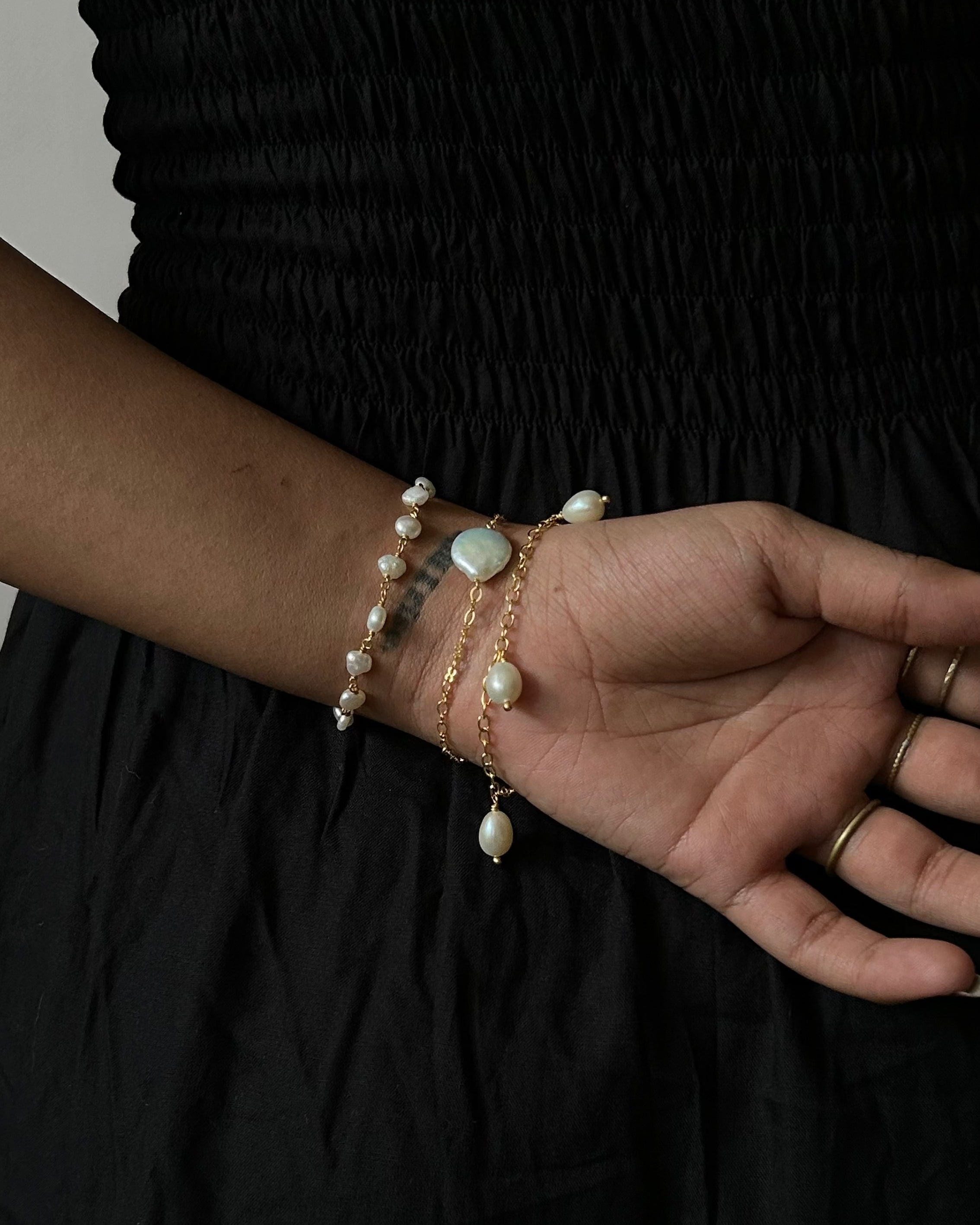 Multi Charm Freshwater pearl bracelet handmade by A Creator's Studio