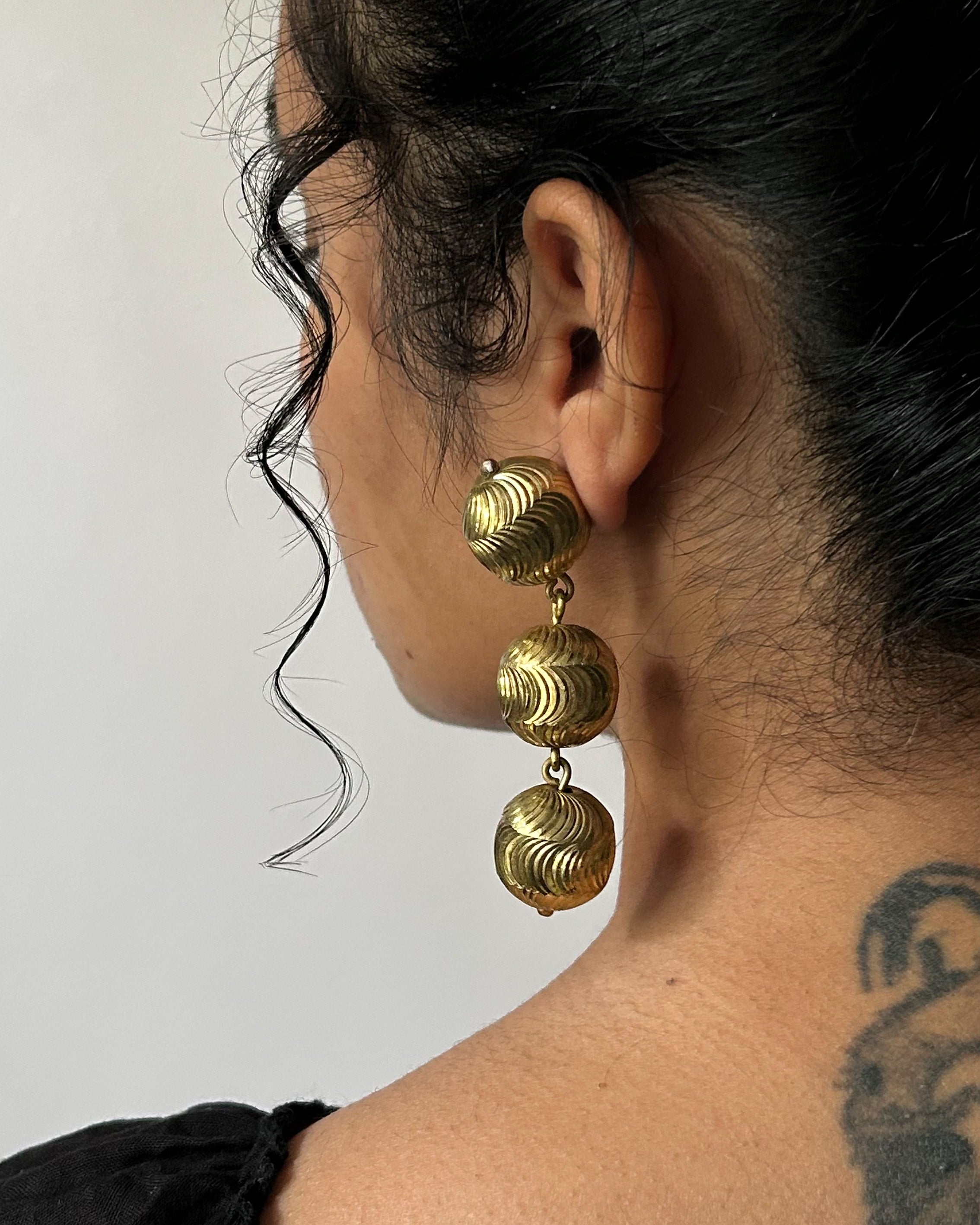 Brass earrings with unique design handmade by A Creator's Studio