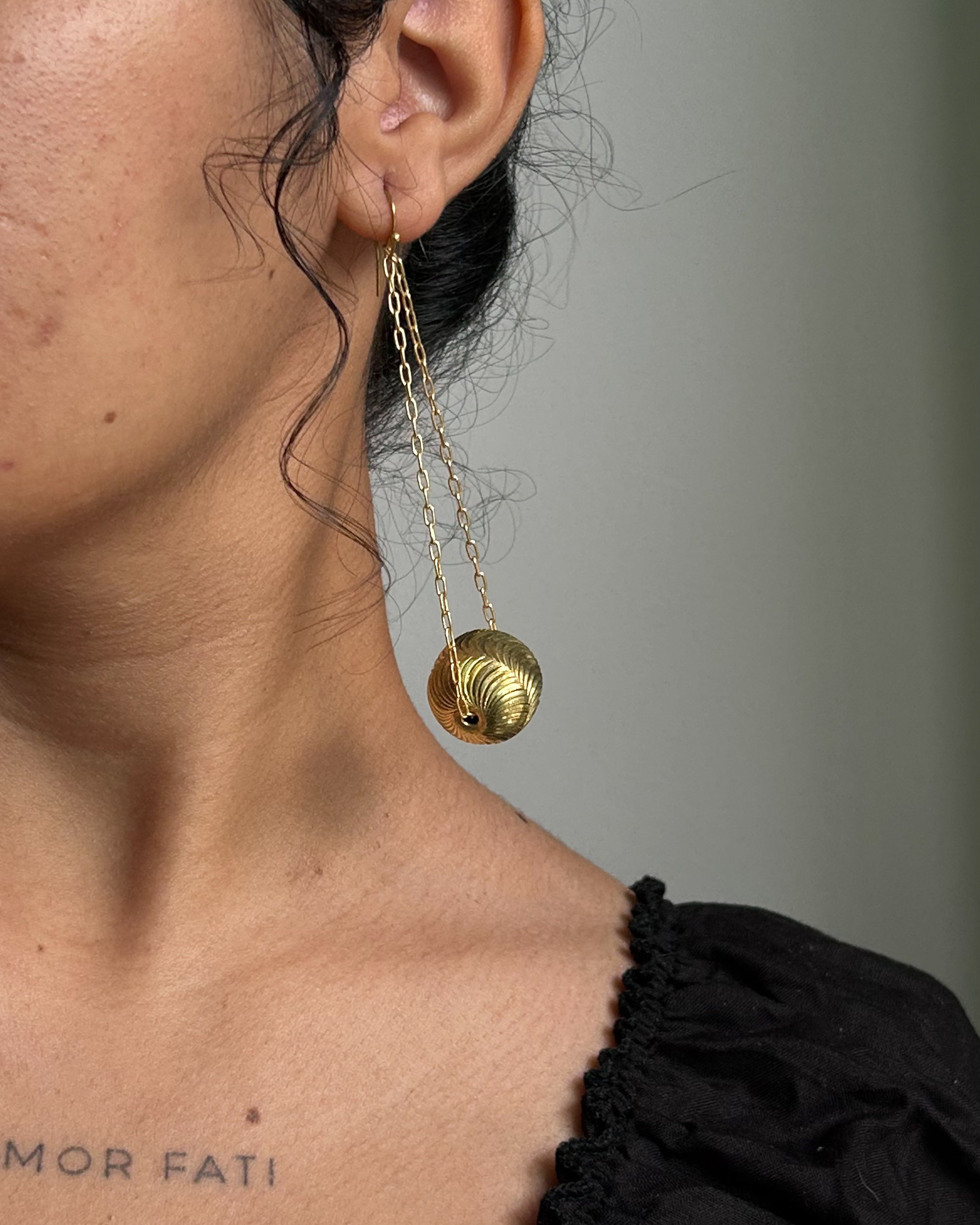 Brass earrings with unique ball design handmade by A Creator's Studio