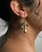 Brass earrings with unique mushroom design handmade by A Creator's Studio