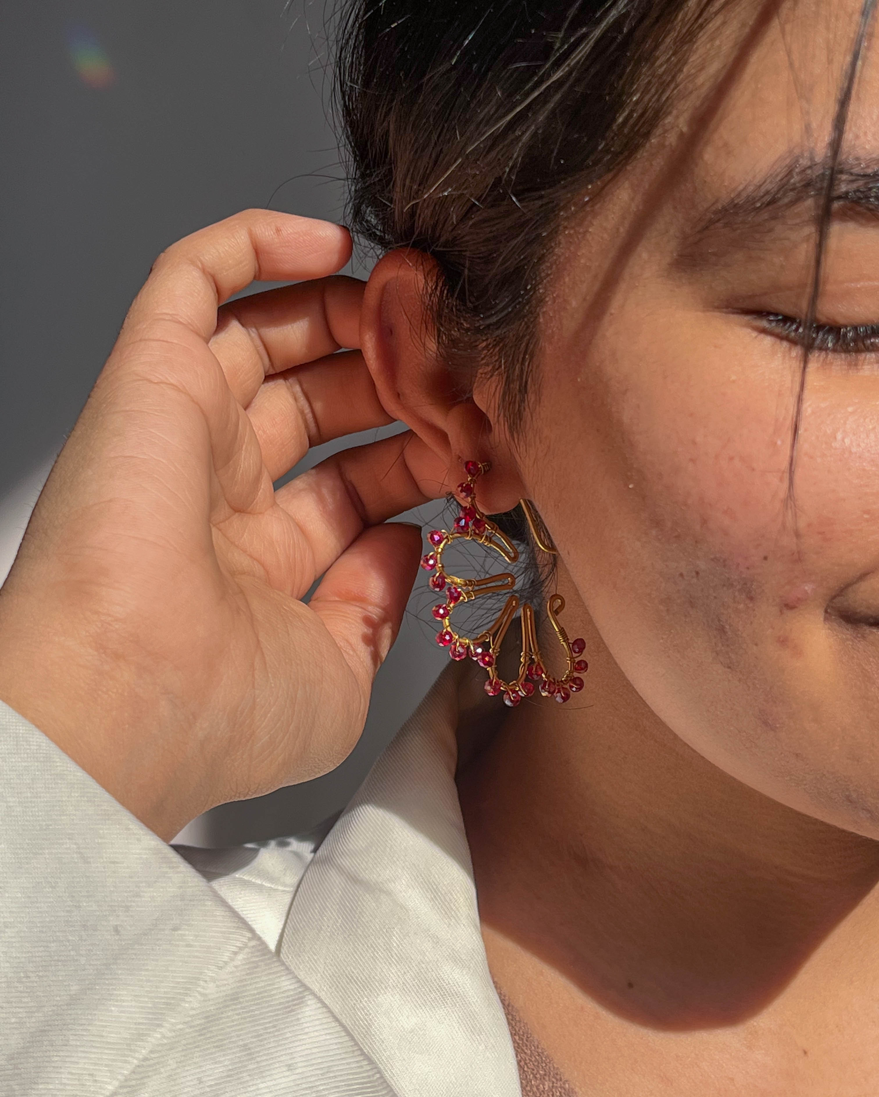 Brass flower earrings with red glass beads handmade by A Creator's Studio
