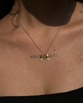 Gold plated bow necklace with a bow pendant handmade by A Creator's Studio