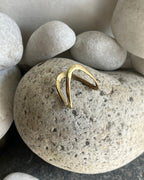 Brass ring with a unique vanki v design handmade by A Creator's Studio