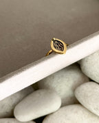 Brass ring with a unique vulva/yoni design handmade by A Creator's Studio