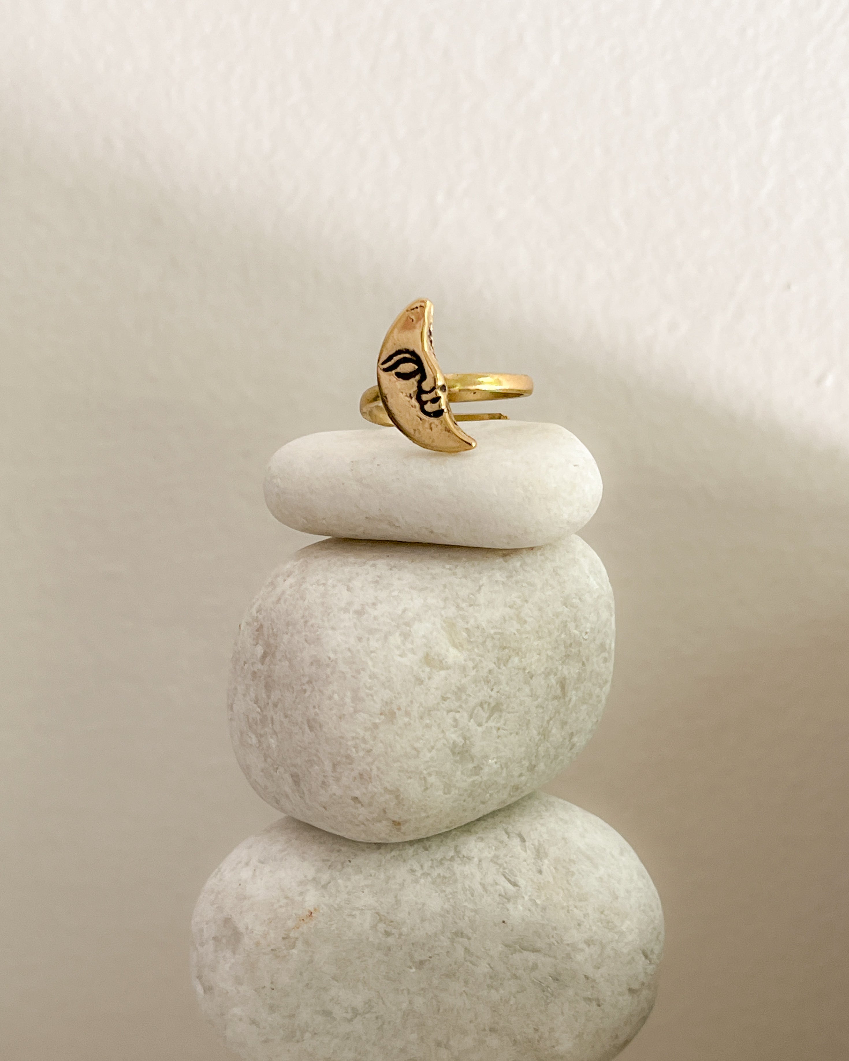 Brass ring with a moon design handmade by A Creator's Studio