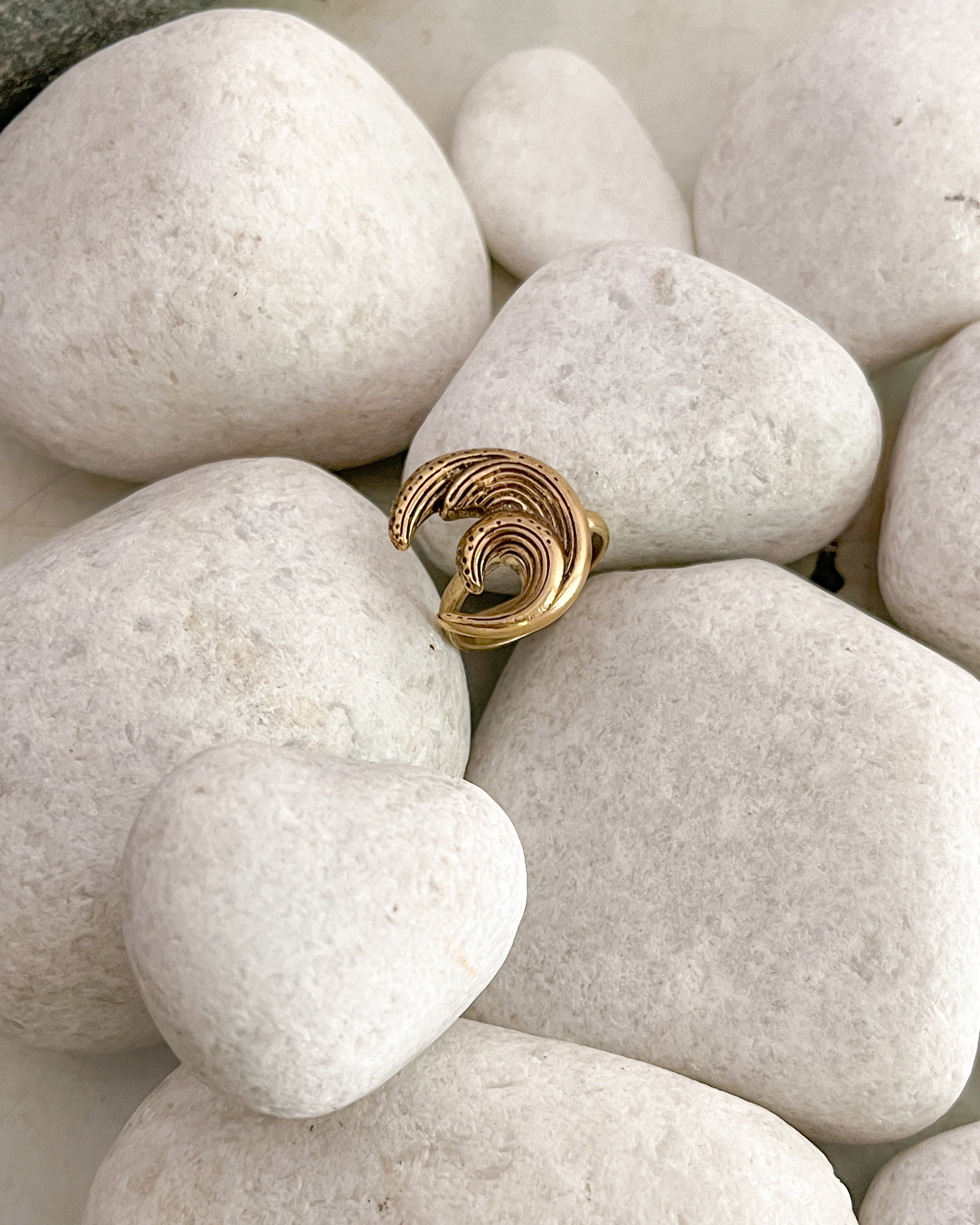 Brass ring with a unique sea wave design handmade by A Creator's Studio