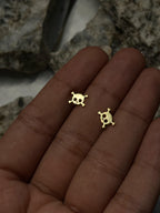 Brass tuds with unique design handmade by a creator's studio