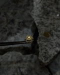 Brass sun-shaped stud earrings handmade by A Creator's Studio