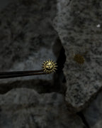 Brass sun-shaped stud earrings handmade by A Creator's Studio
