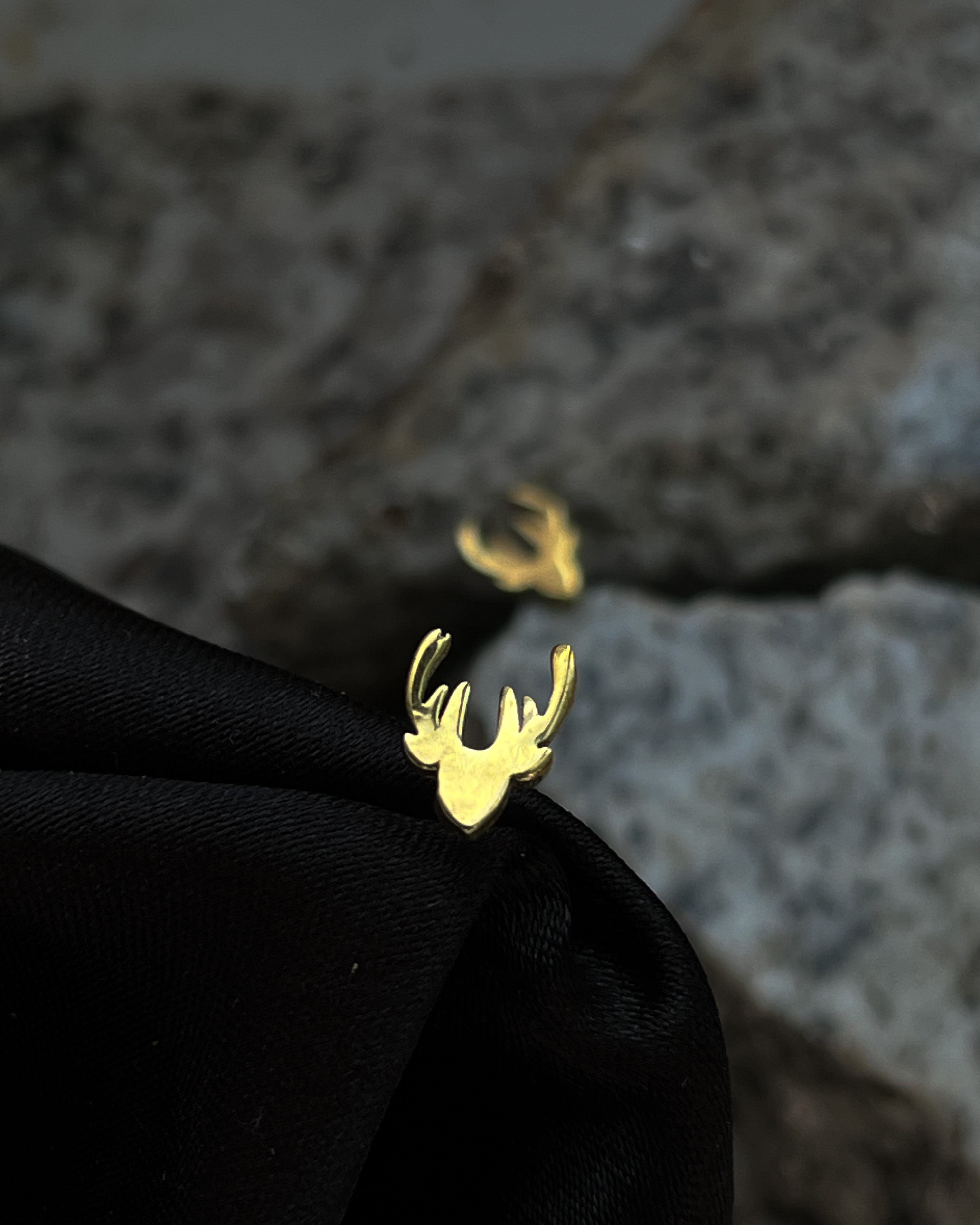 Brass tuds with unique design handmade by a creator's studio