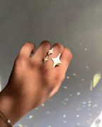 Brass ring with a unique sparkle emoji design handmade by A Creator's Studio