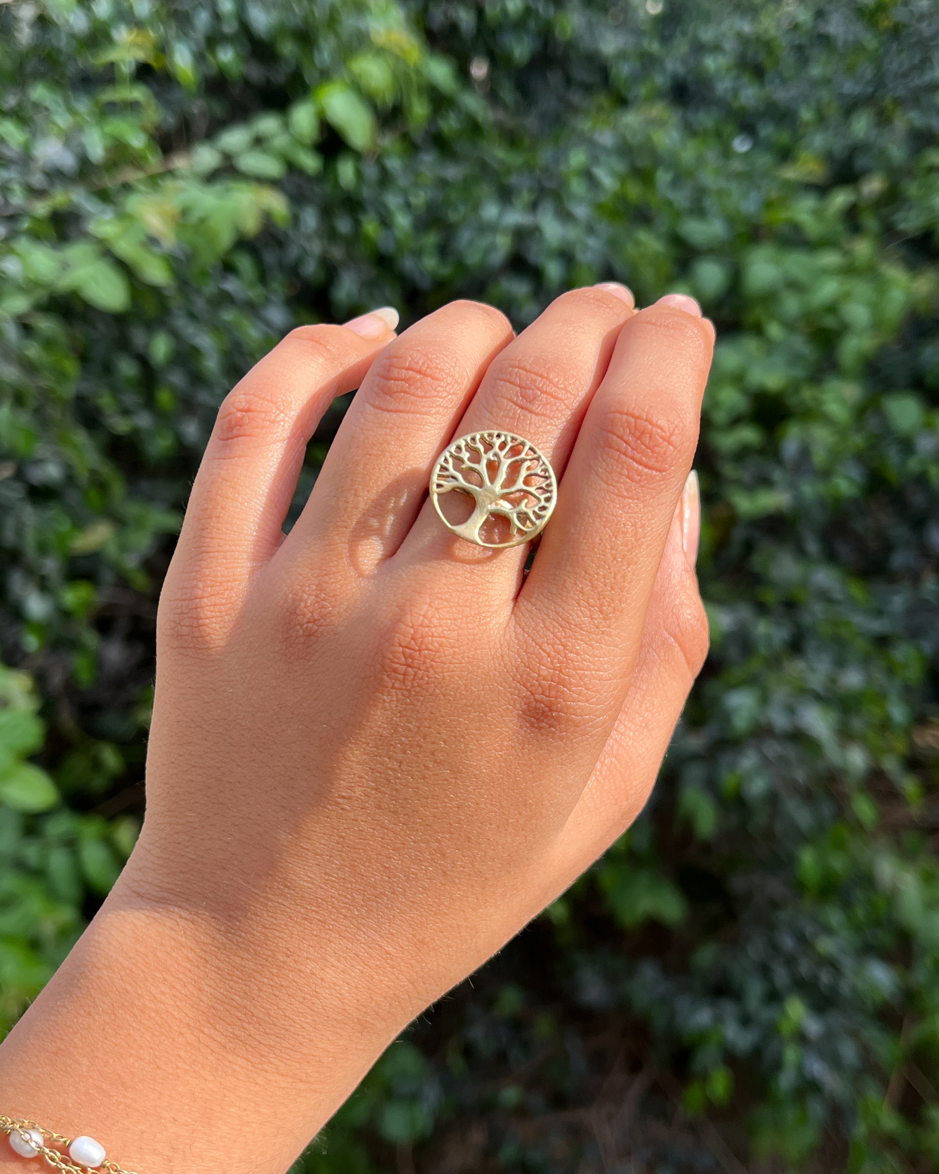 Brass ring with a unique tree design handmade by A Creator's Studio