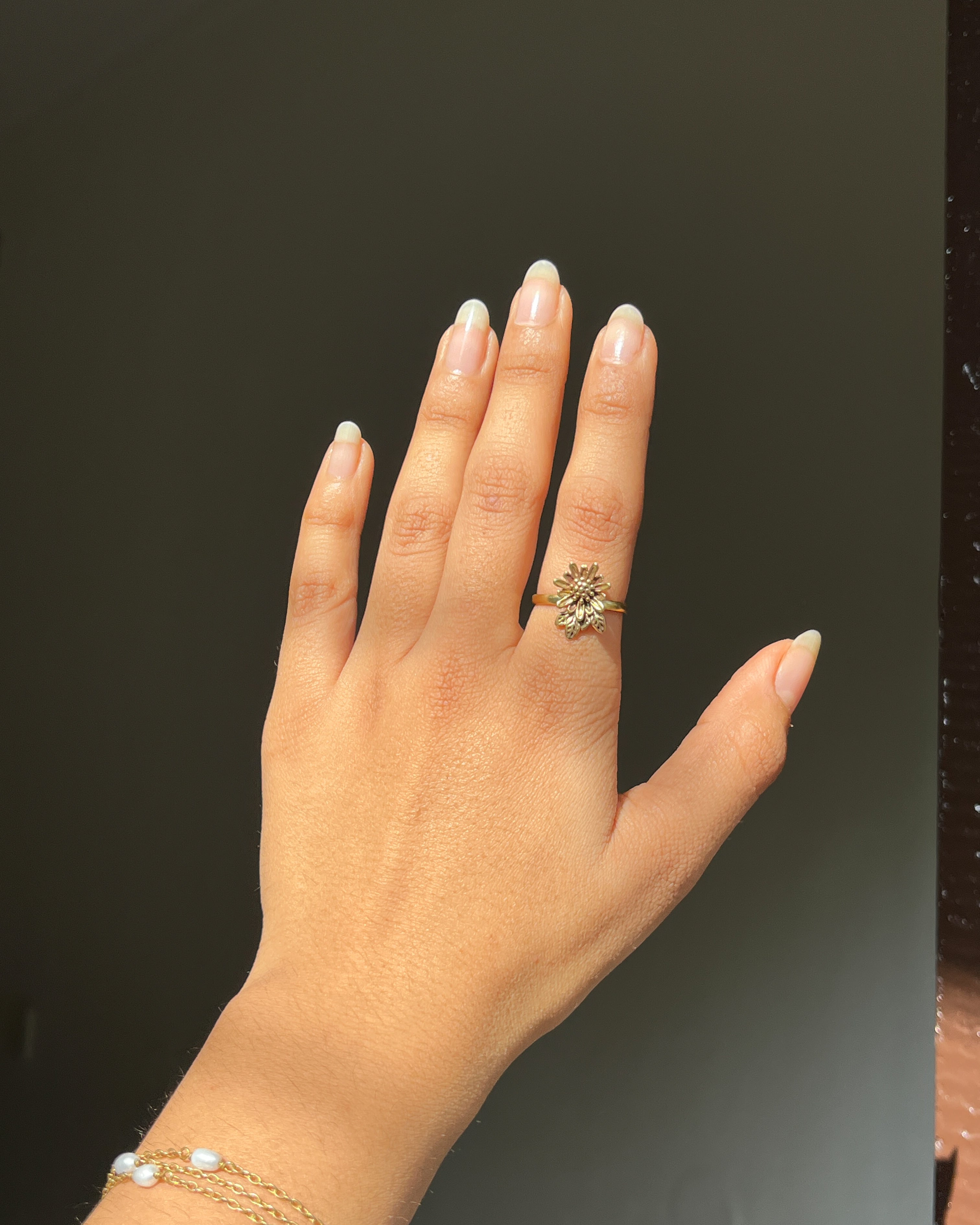 Brass ring with a unique sunflower design handmade by A Creator's Studio