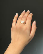 Brass ring with a butterfly design handmade by A Creator's Studio