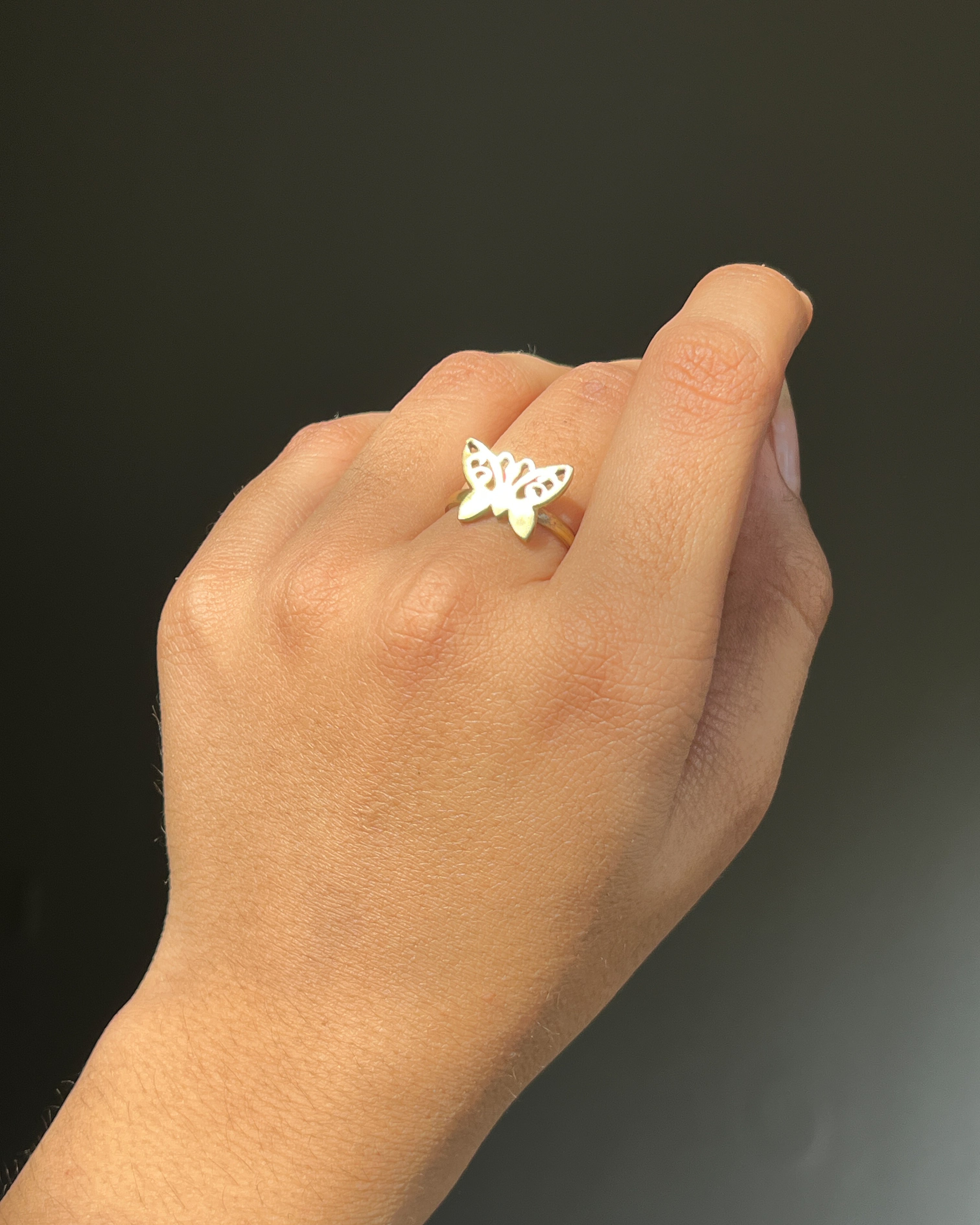 Brass ring with a butterfly design handmade by A Creator's Studio