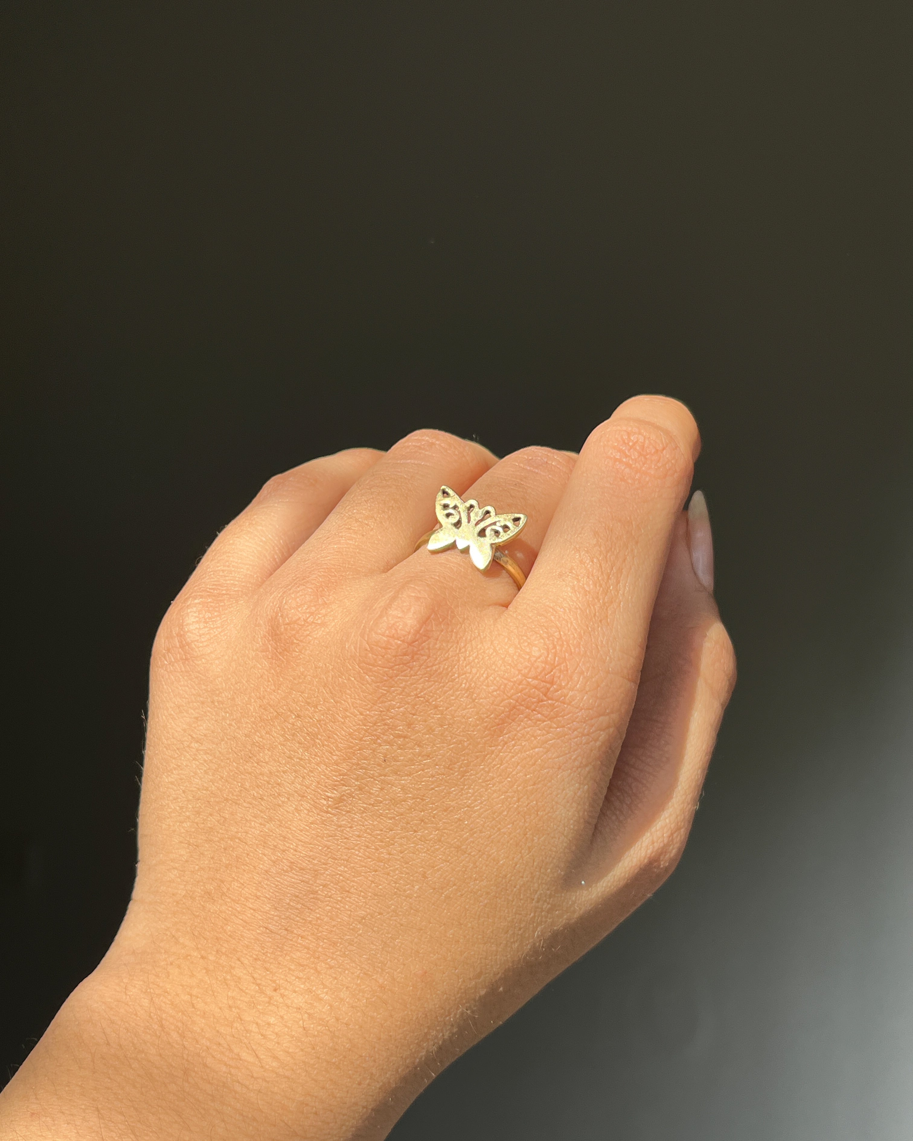 Brass ring with a butterfly design handmade by A Creator's Studio