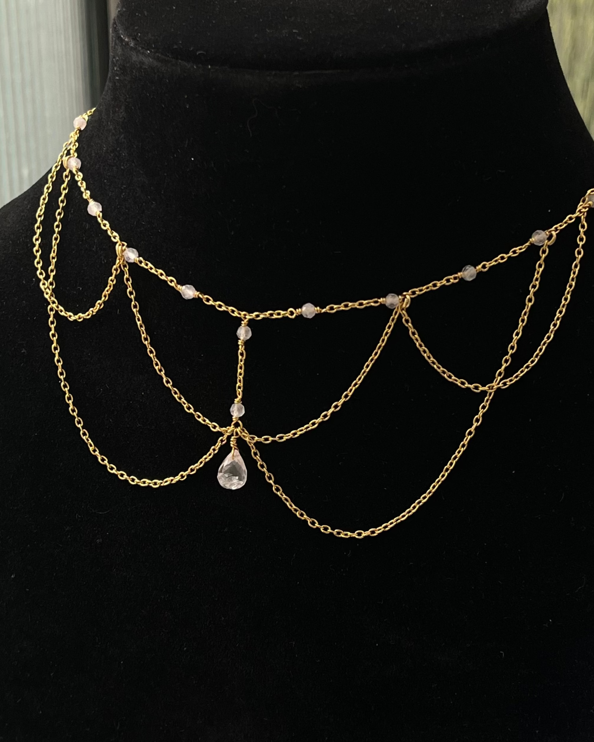 Gold Plated layered chain necklace with a teardrop crystal handmade by A Creator's Studio