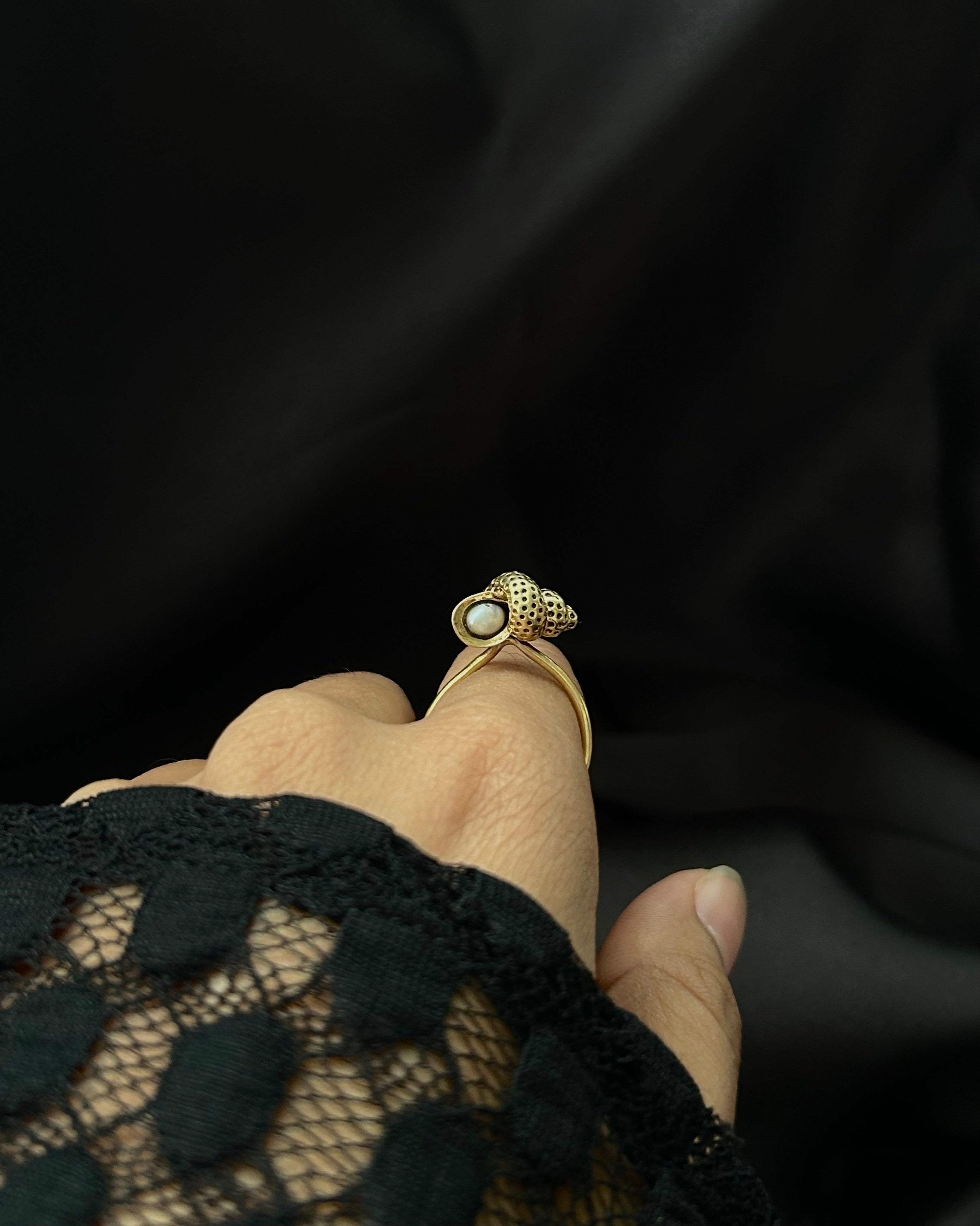 Brass ring with a unique sea shell conch with pearl design handmade by A Creator's Studio