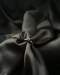 Brass ring with a evil eye design handmade by A Creator's Studio