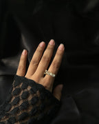 Brass ring with a clear quartz crystal design handmade by A Creator's Studio