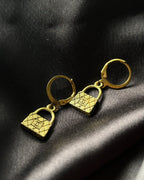 Brass earrings handmade by A Creator's Studio