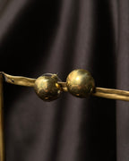 Brass round-shaped stud earrings handmade by A Creator's Studio