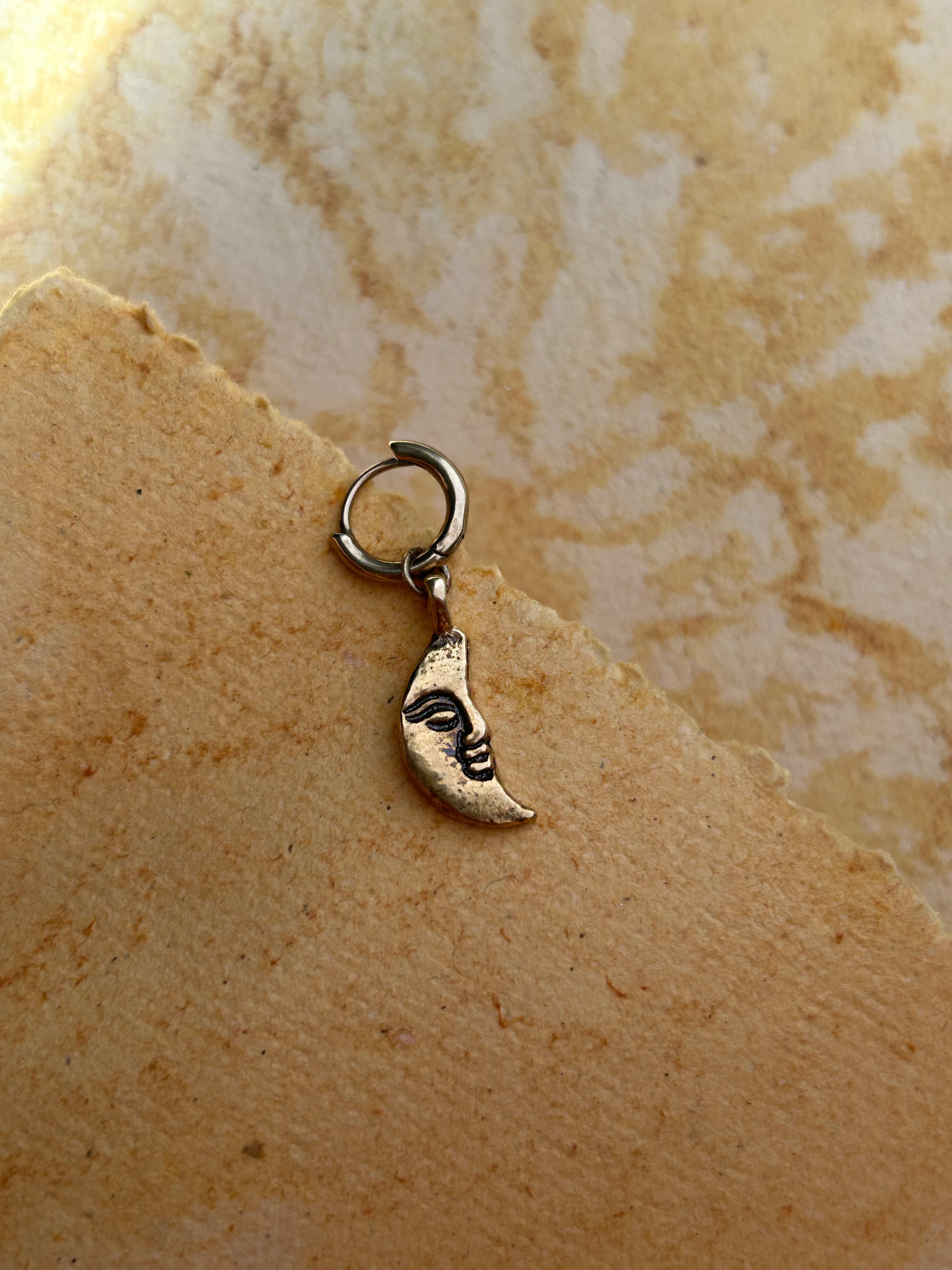 Brass sun and moon earrings handmade by A Creator's Studio
