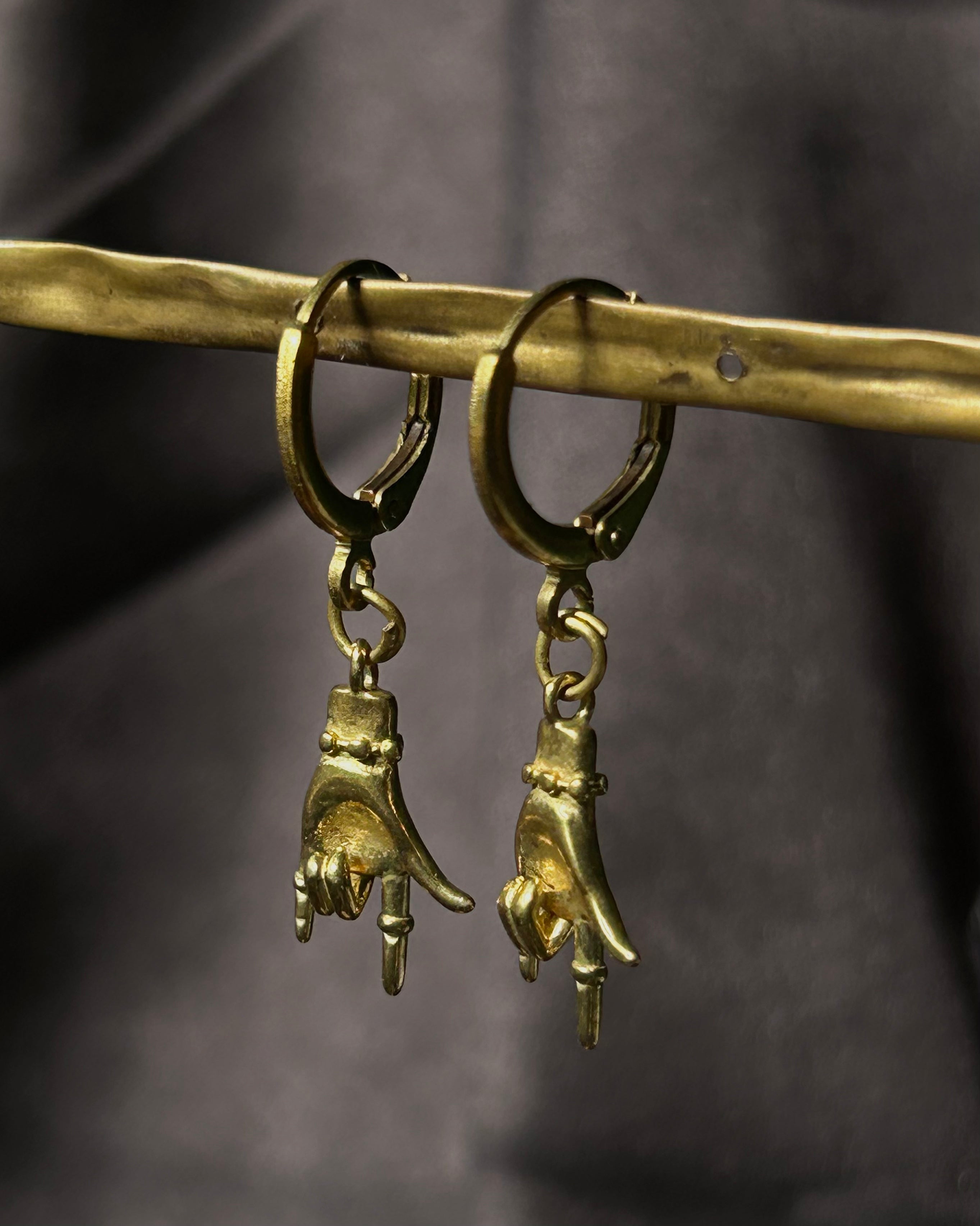 Brass earrings handmade by A Creator's Studio
