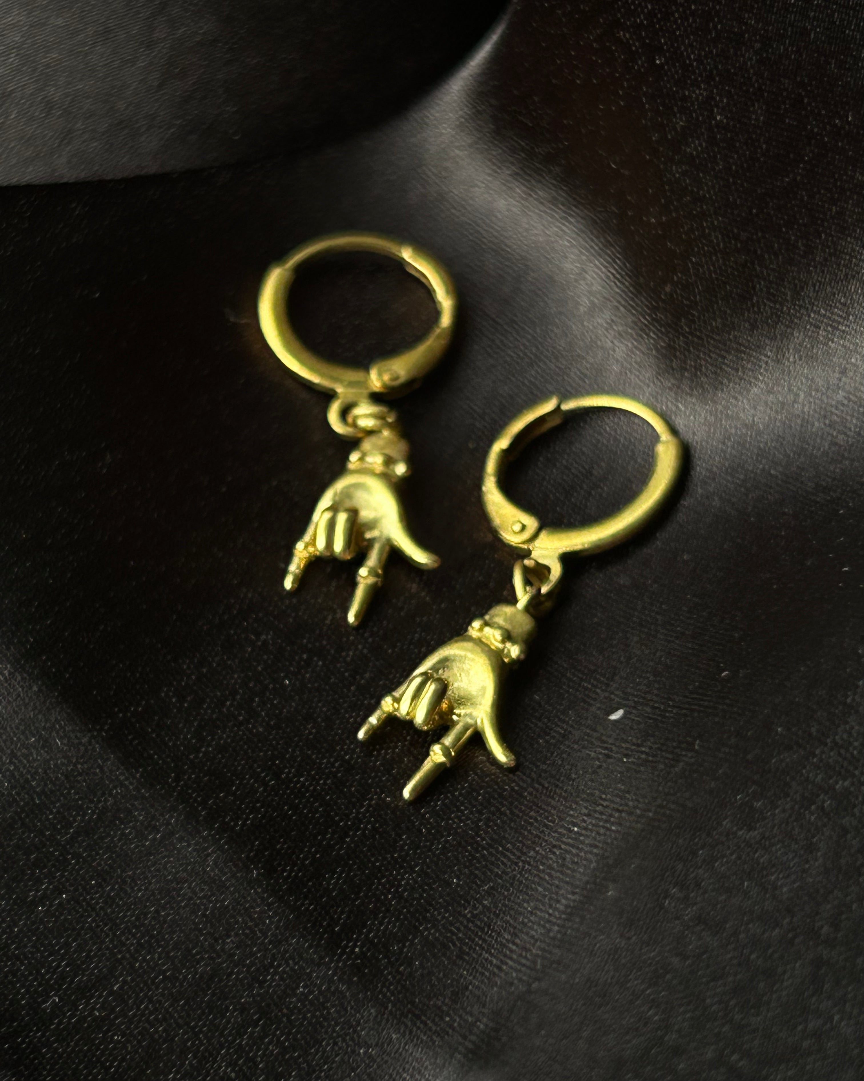 Brass flower earrings handmade by A Creator's Studio
