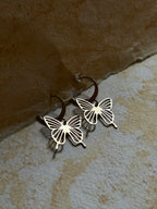 Brass earrings handmade by A Creator's Studio