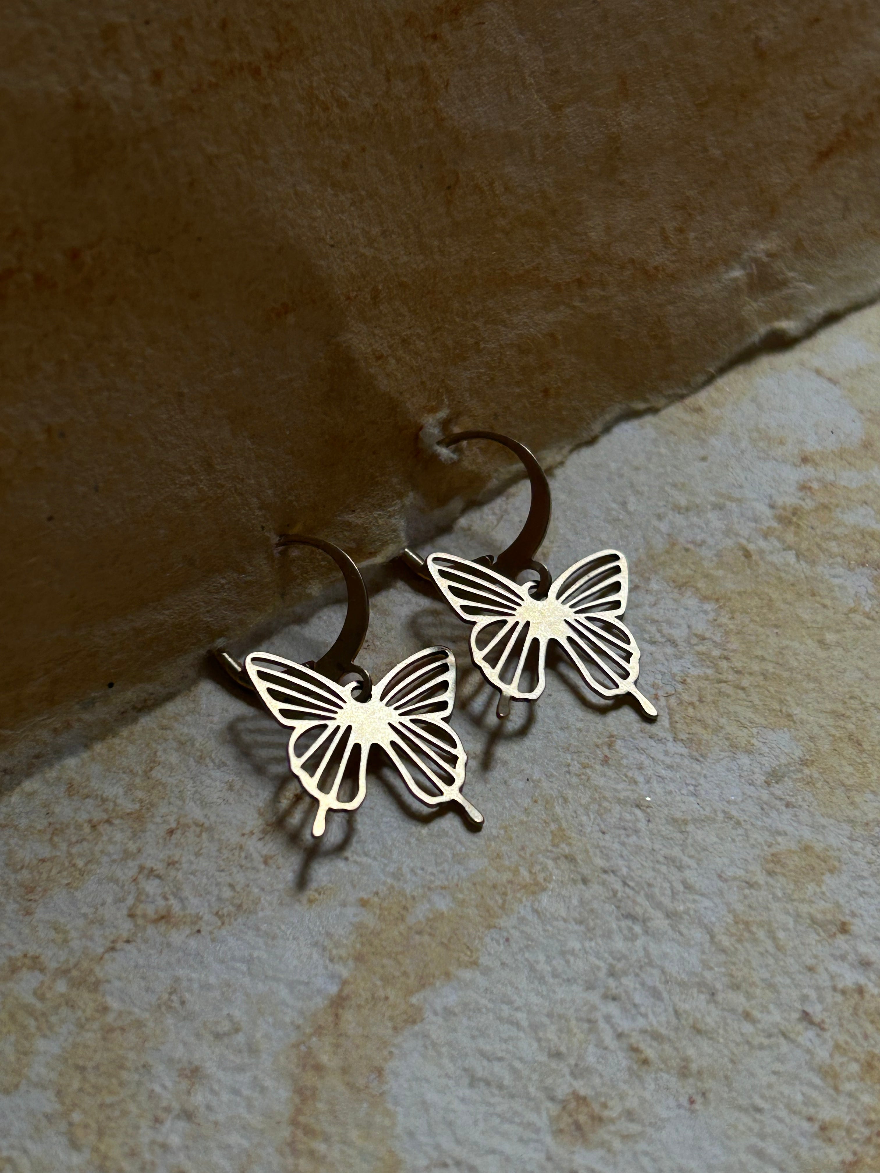 Brass earrings handmade by A Creator's Studio