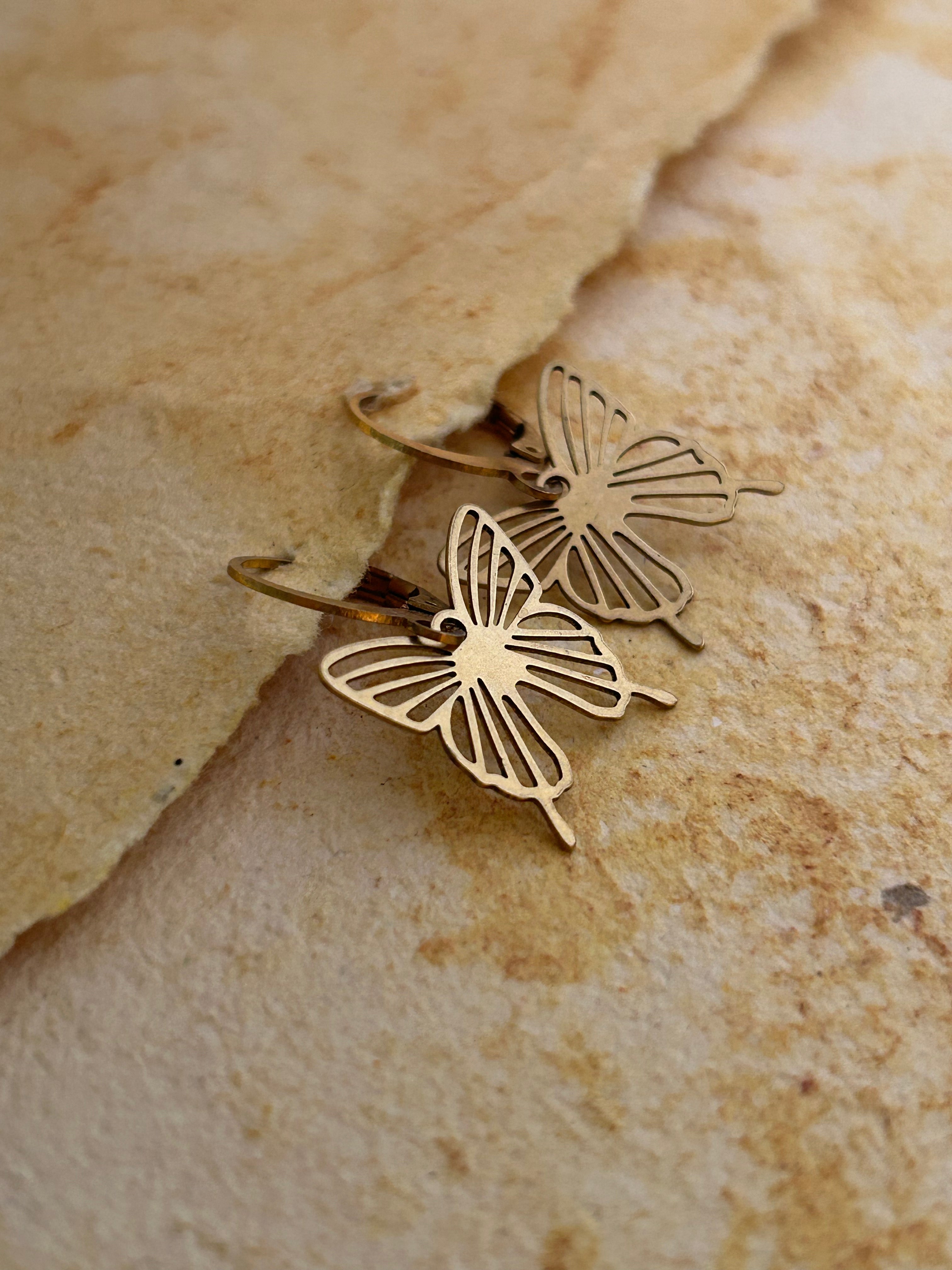 Brass earrings handmade by A Creator's Studio