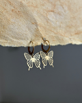 Brass earrings handmade by A Creator's Studio