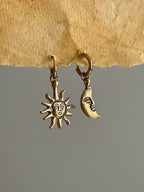 Brass sun and moon earrings handmade by A Creator's Studio