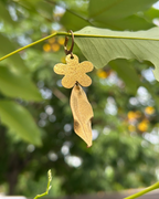 Brass earrings handmade by A Creator's Studio