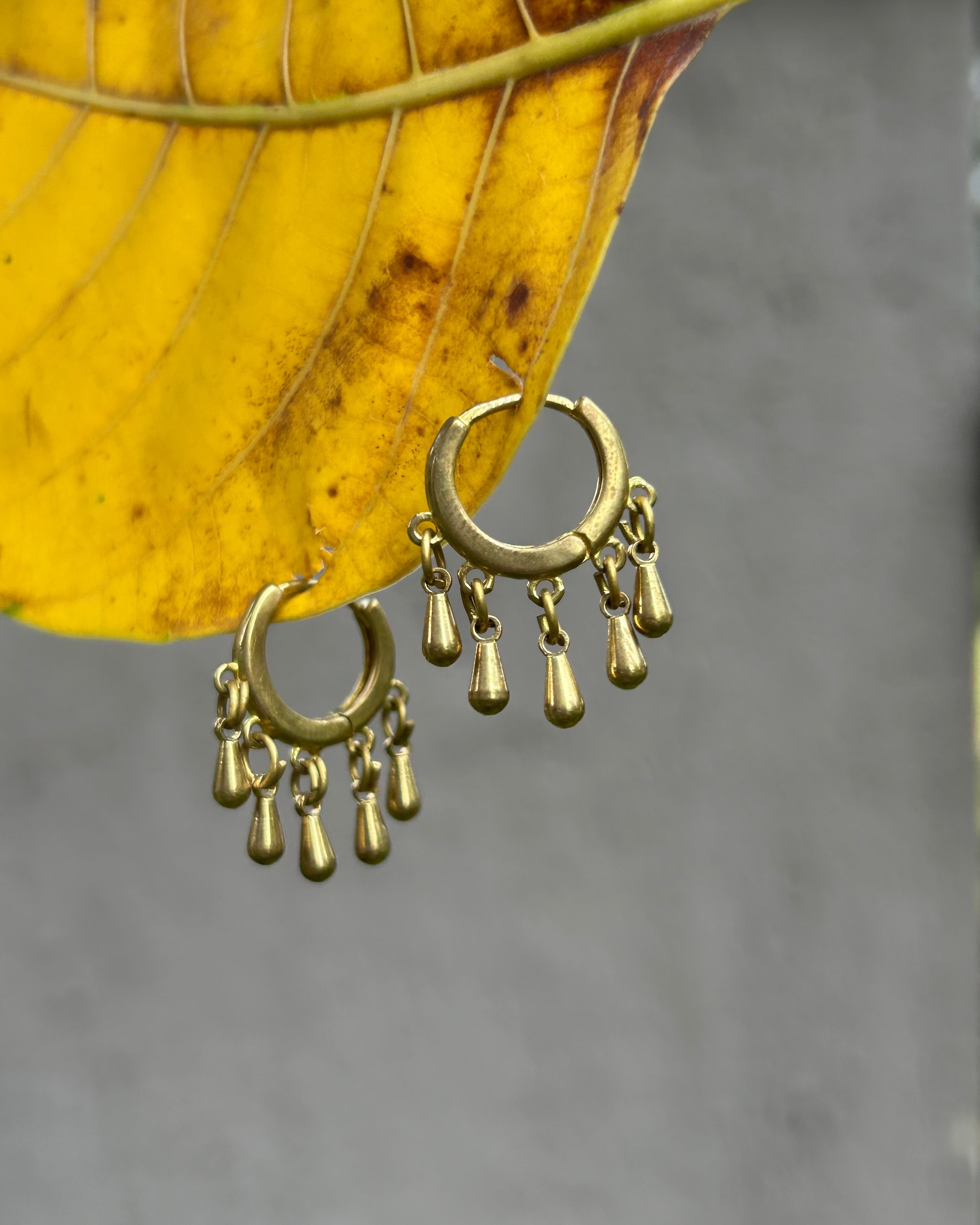 Brass earrings handmade by A Creator's Studio