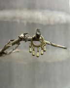 Brass earrings handmade by A Creator's Studio