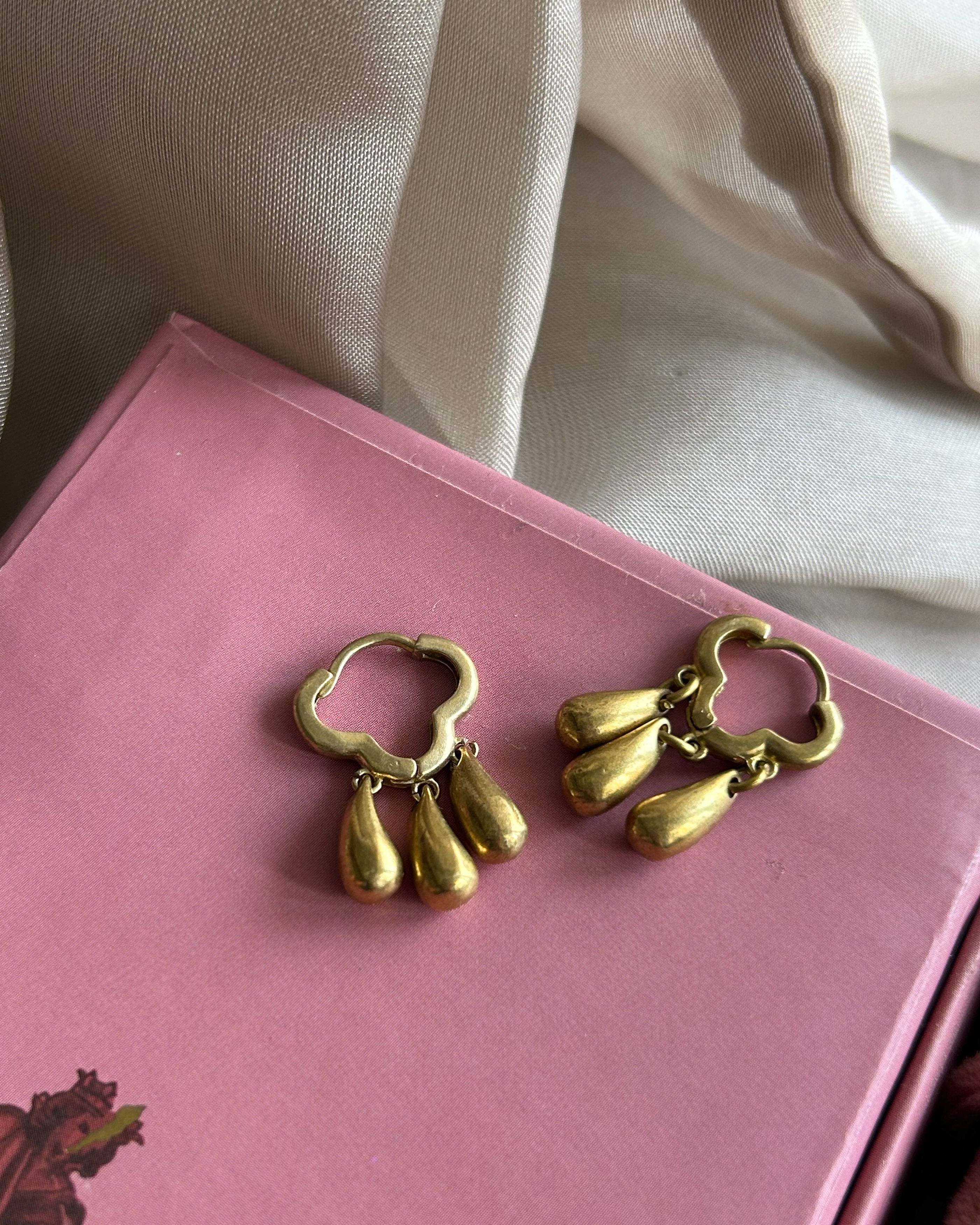 Brass earrings with unique raindrop and cloud design handmade by A Creator's Studio